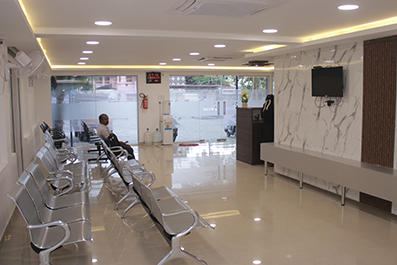 Bright patient waiting area inside Niveena Homeo Clinic in Chennai